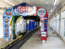 Automotive Dealership Contractors Quick Clean Drive Thru Entrance by Fred Olivieri