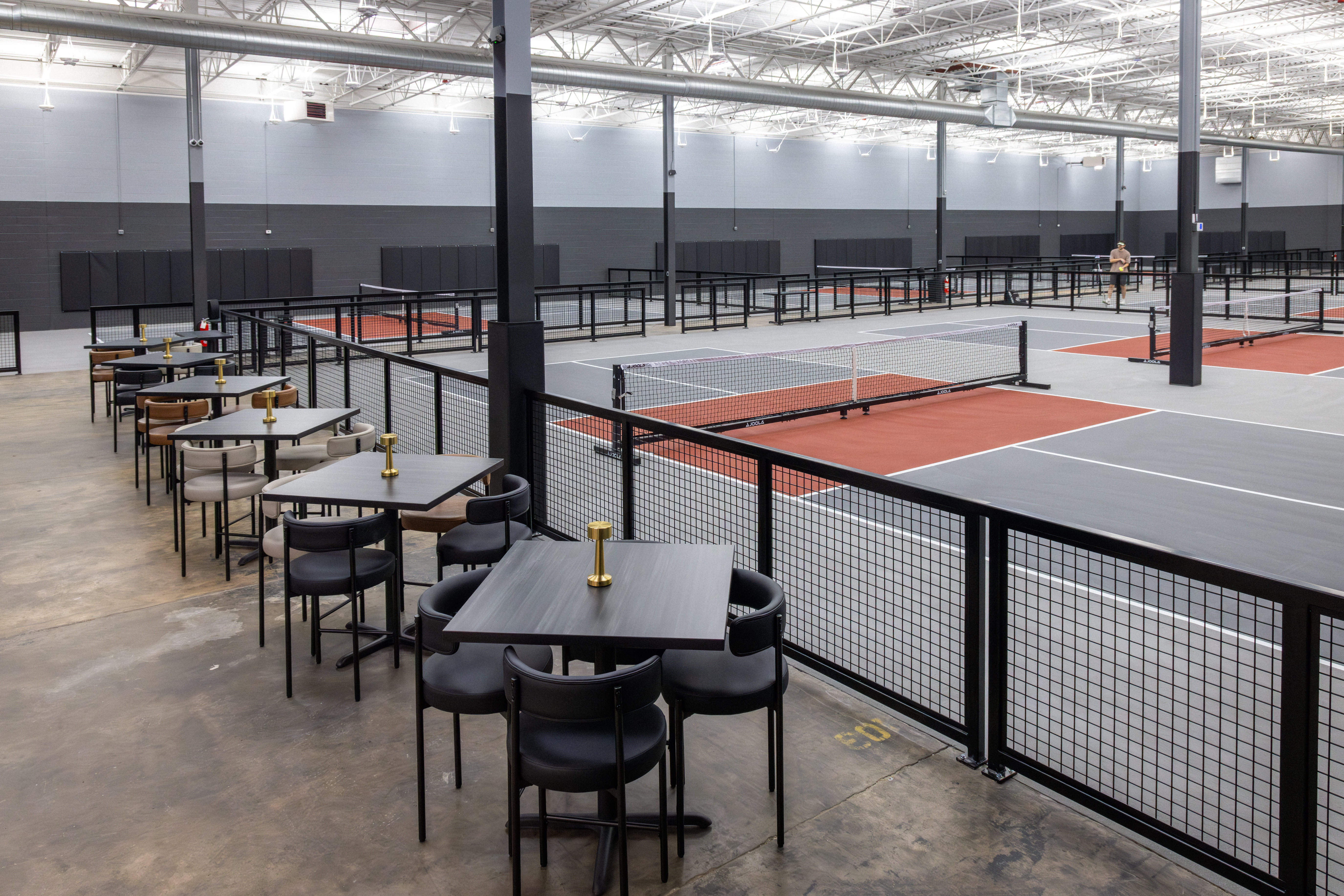 Indoor pickball facility mezzanine dining by fred olivieri construction company v2