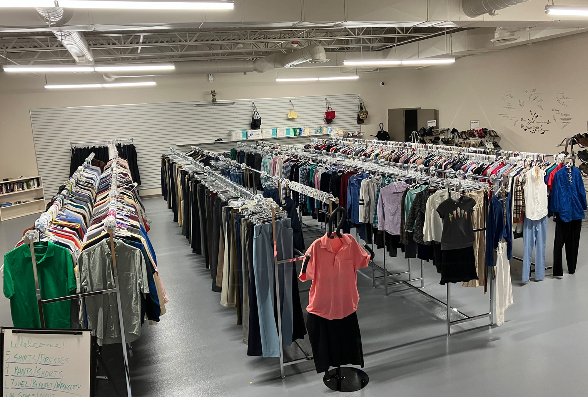 Refuge of Hope Donation Center Construction Nonprofit Organization Clothing Racks by Fred Oliveri