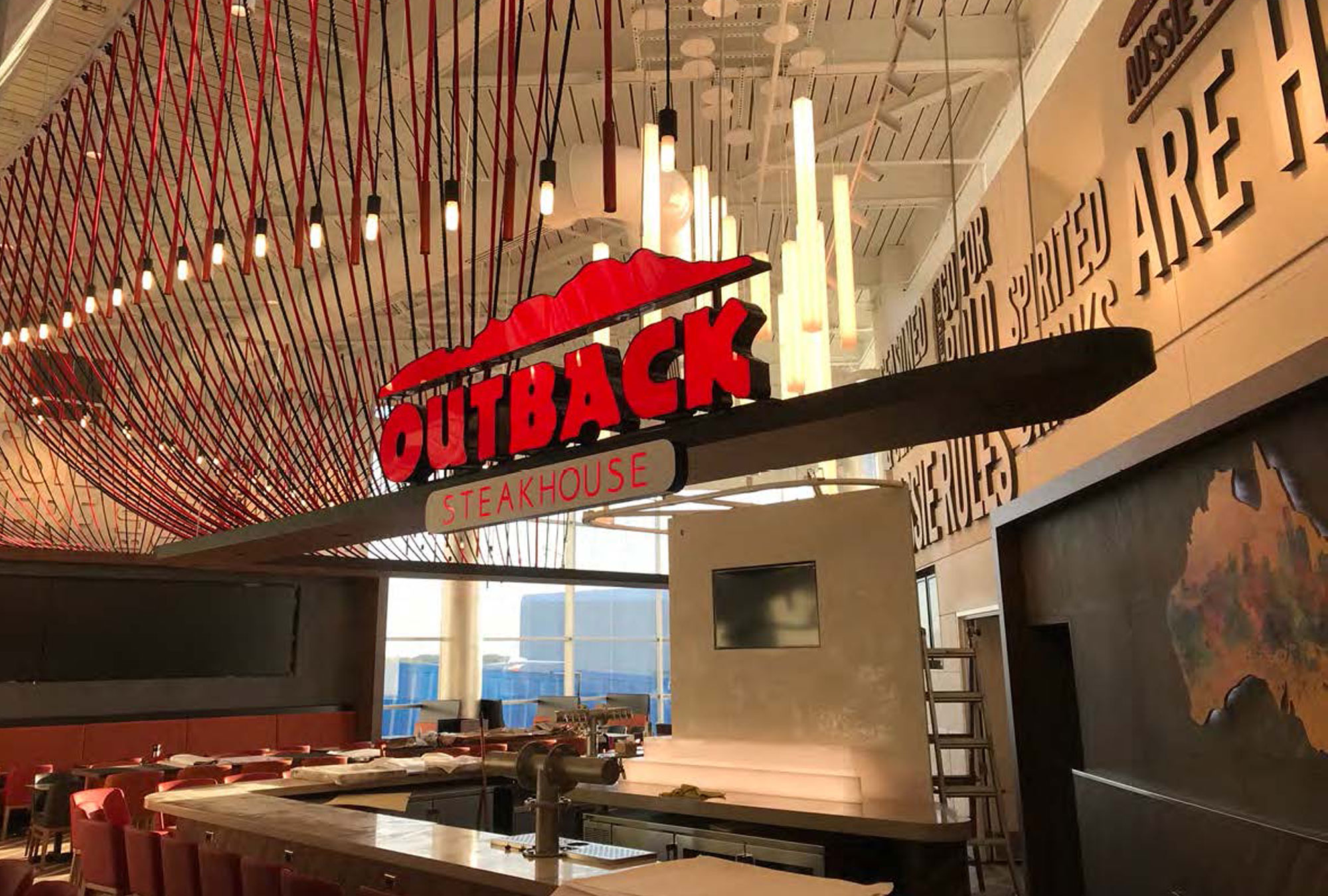 Top Restaurant Contractor Outback Sign by Fred Olivieri
